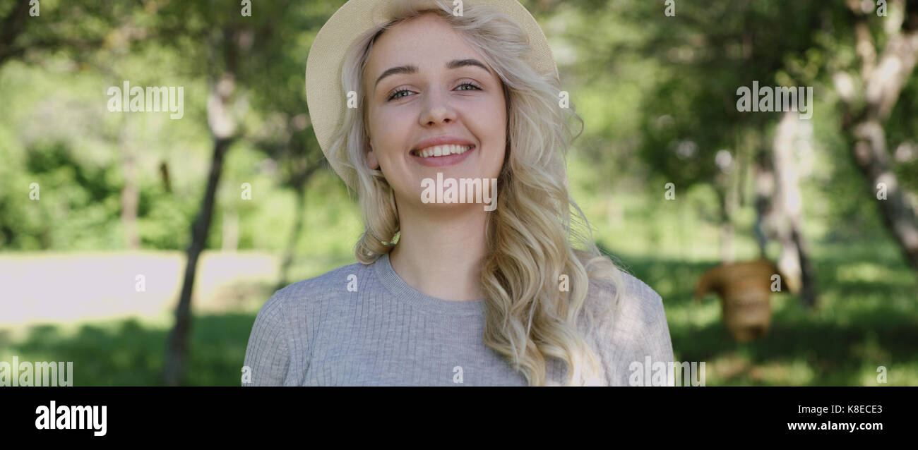 Portrait of the young woman in a hat Stock Photo - Alamy
