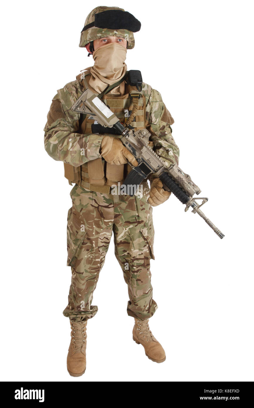 soldier with assault rifle on white background Stock Photo - Alamy