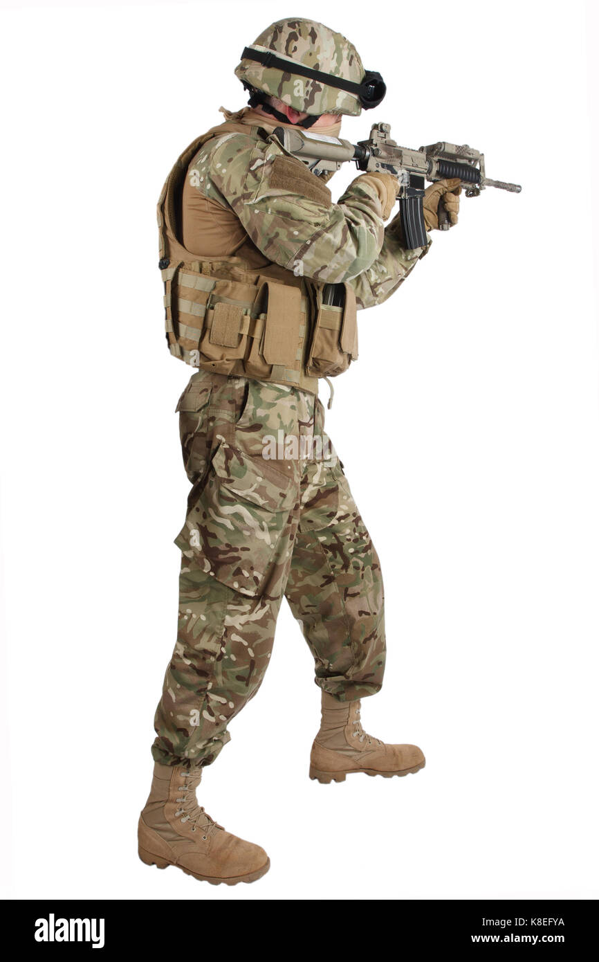 soldier with assault rifle on white background Stock Photo - Alamy