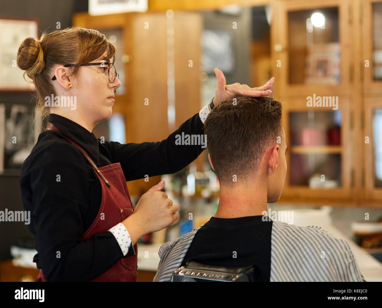 Young Man Getting A Short Trendy Haircut In The Barber Shop Stock