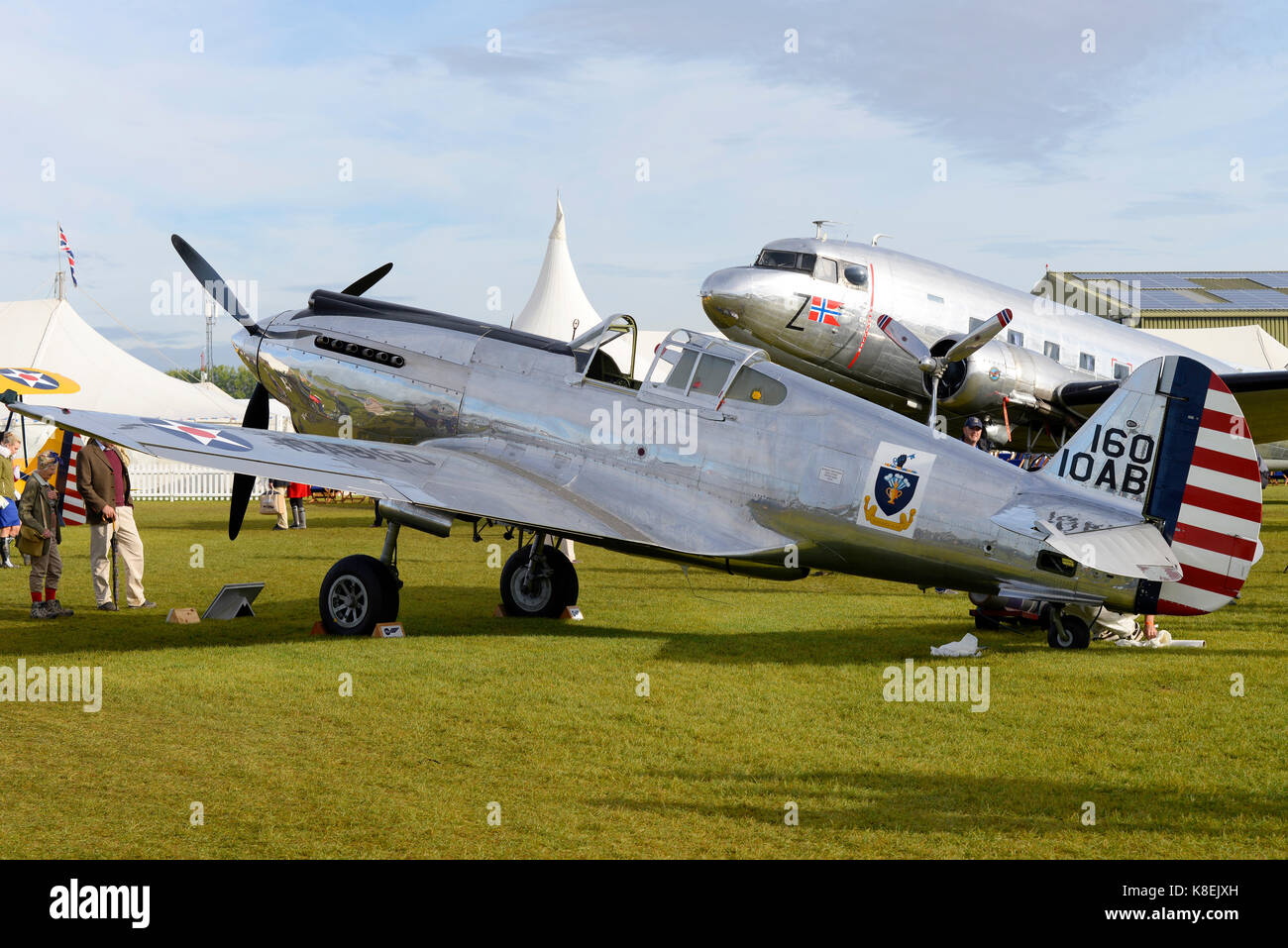 Curtiss P-40C Kittyhawk of The Fighter Collection at Goodwood Revival 2017. Polished aluminium , aluminum. Space for copy Stock Photo