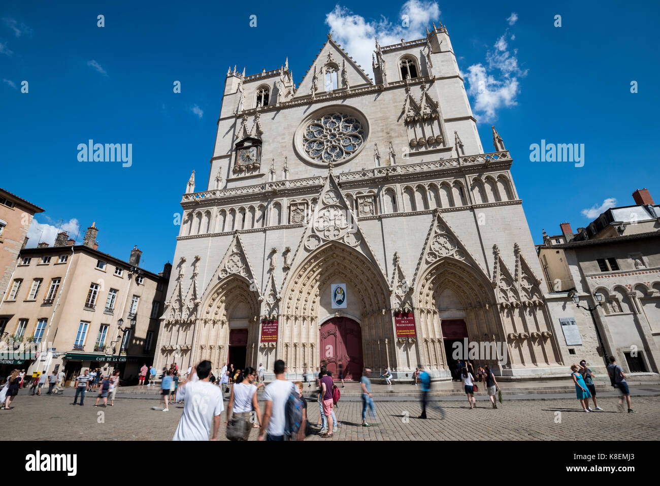 Cathedral Saint-Jean-Baptiste de Lyon with crowd, Roman Catholic church located on Place Saint-Jean in Lyon, France Stock Photo