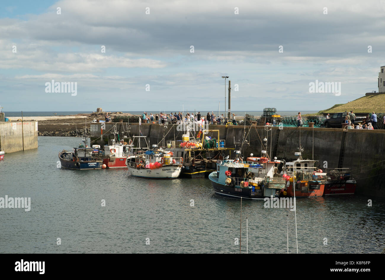 August Bank holiday visitors at Seahouse, Northumberland, England Stock Photo