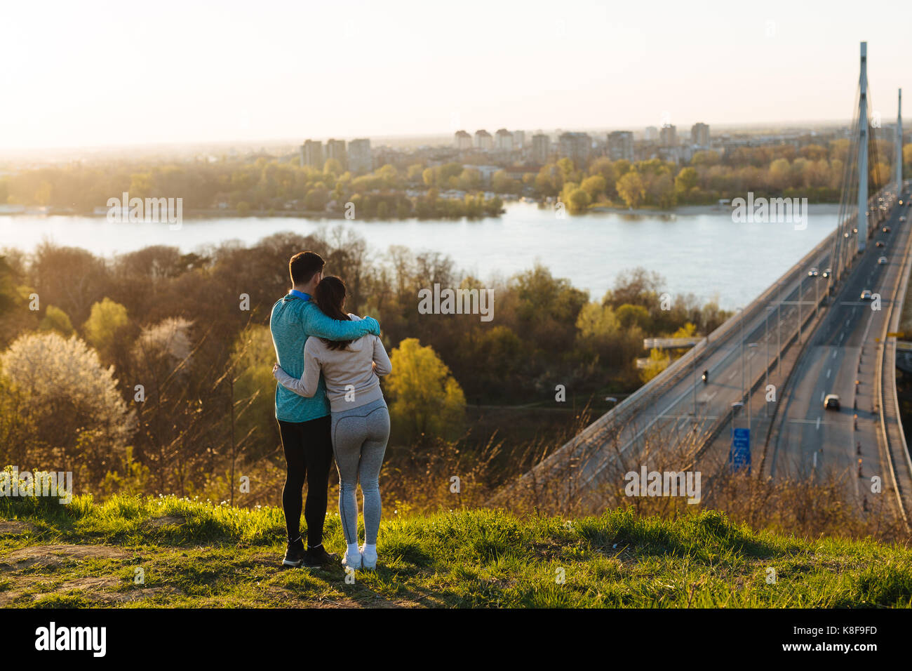Happy young sporty couple sharing romantic moments Stock Photo - Alamy