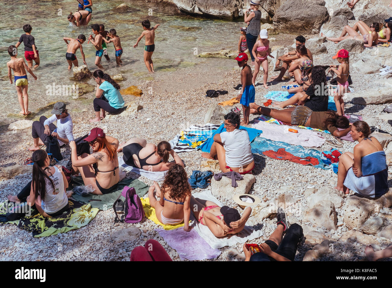 Crawded and small beach, Calanque de Sugiton,Calanques National Park, southern France Stock Photo