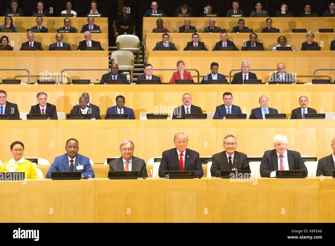 U.S. President Donald Trump, center, sits with world leaders for a group photo at the 'Reforming the United Nations: Management, Security, and Development' meeting during the 72nd Session of the United Nations General Assembly September 18, 2017 in New York City. United Nations Secretary General Antonio Guterres is to the presidents left. Stock Photo