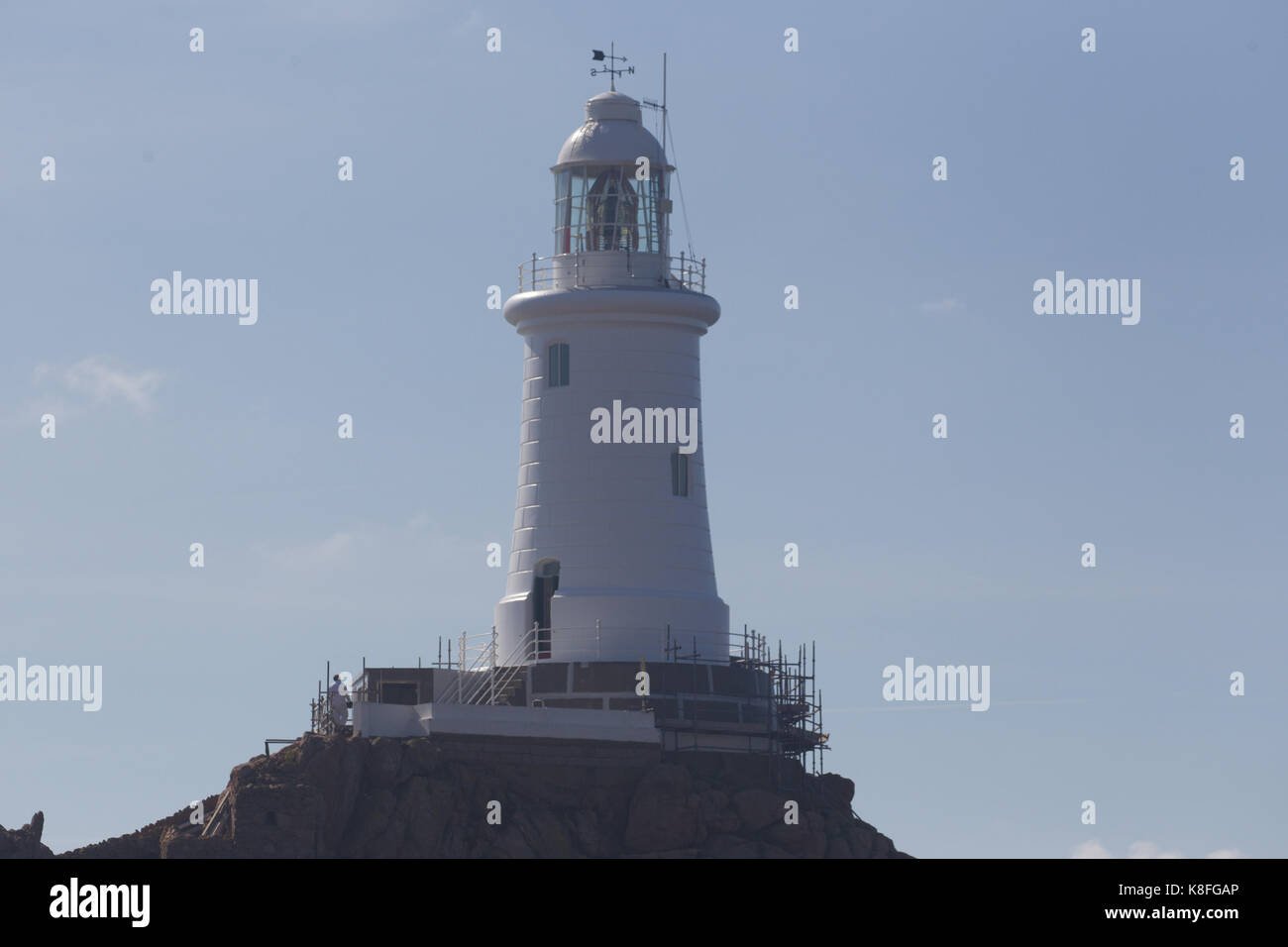 .Cordiere Lighthouse.Jersey 19th September 2017 Channel Islands .For 5 months the lighthouse (135ft tall) has been covered in scaffolding while Jersey Infrastructure staff(painters) burnt of the old paint & sandblasted before repainting it with a fresh new coat. The painters now hope to finish in the next two weeks, weather permiting Credit: Gordon Shoosmith/Alamy Live News Stock Photo