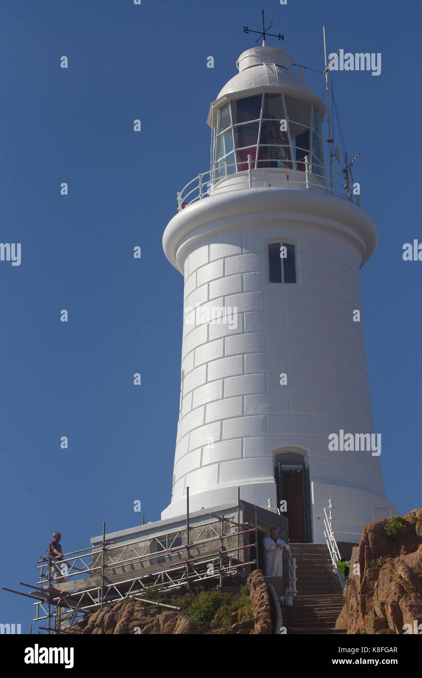 .Cordiere Lighthouse.Jersey 19th September 2017 Channel Islands .For 5 months the lighthouse (135ft tall) has been covered in scaffolding while Jersey Infrastructure staff(painters) burnt of the old paint & sandblasted before repainting it with a fresh new coat. The painters now hope to finish in the next two weeks, weather permiting Credit: Gordon Shoosmith/Alamy Live News Stock Photo