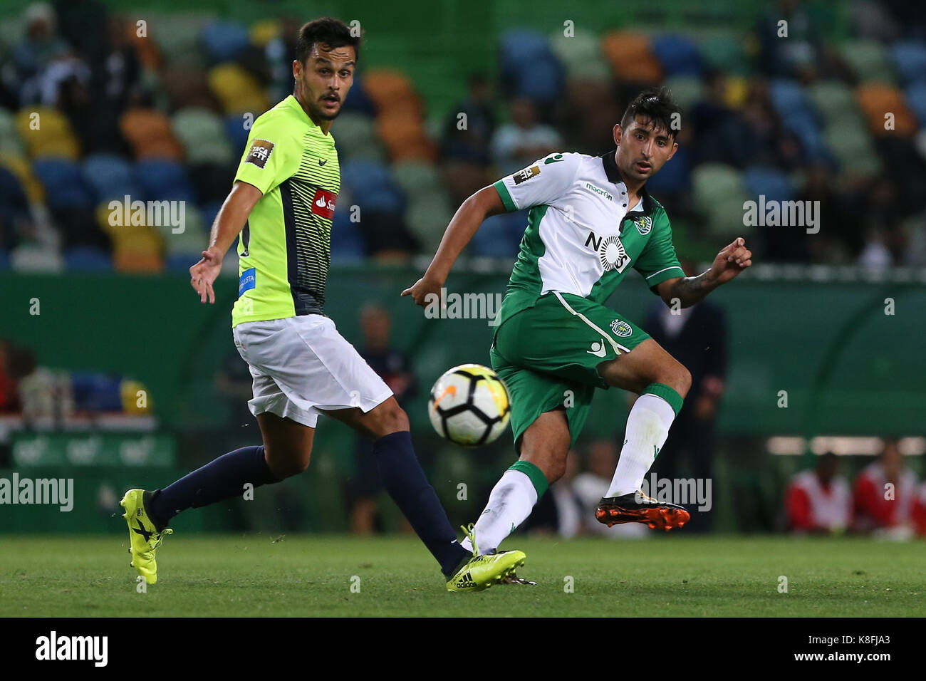 Lisbon, Portugal. 19th Sep, 2017. Sporting's forward Bryan Ruiz from Costa Rica (R) and Maritimo's midfielder Filipe Oliveira from Portugal (L) during the Portuguese Cup 2017/18 match between Sporting CP v CS Maritimo, at Alvalade Stadium in Lisbon on September 19, 2017. Credit: Bruno Barros/Alamy Live News Stock Photo