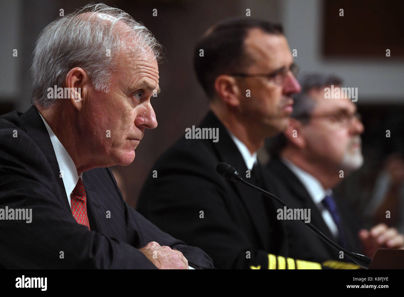 Washington, USA. 19th Sep, 2017. U.S. Navy Secretary Richard Spencer (L) and Chief of Naval Operations Admiral John Richardson (C) attend a hearing on recent U.S. Navy incidents before Senate Armed Services Committee on Capitol in Washington, DC, the United States, on Sept. 19, 2017. Top leaders of the U.S. Navy were urged to do better on Tuesday as they appeared before the Senate hearing over a series of deadly ship collisions involving the Pacific fleet. Credit: Yin Bogu/Xinhua/Alamy Live News Stock Photo