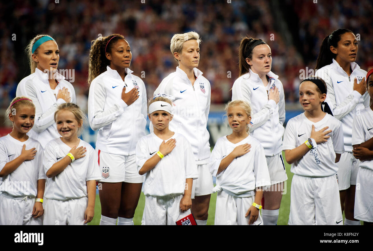 Cincinnati, Ohio, USA. 19th Sep, 2017.  Team USA covers their hearts in salute during the national anthem while Megan Rapinoe (center) silently protests before their match against New Zealand at Nippert Stadium. Cincinnati, Ohio. Brent Clark/Alamy Live News Stock Photo