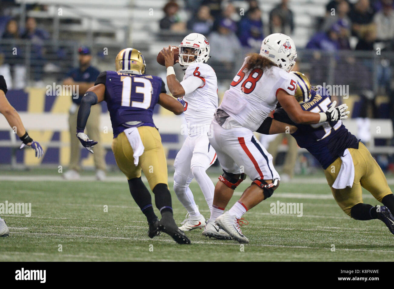 Seattle, WA, USA. 16th Sep, 2017. Fresno State quarterback Marcus McMaryion (6) looks to throw under pressure during a NCAA football game between the Fresno State Bulldogs and the Washington Huskies. The game was played at Husky Stadium in Seattle, WA. Jeff Halstead/CSM/Alamy Live News Stock Photo