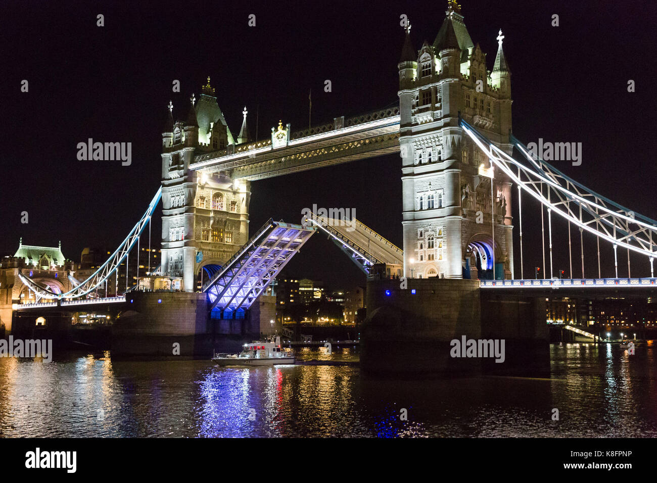 London, UK. 19th Sep, 2017. Royal Navy ship, HMS Puncher sails under a raised Tower Bridge on the River Thames to mark a change in command of the Royal Navy Reserve (RNR) following an official ceremony at HMS President, where Commander John Harriman handed over command of HMS President RNR to Commander Richmal Hardinge. Credit: Vickie Flores/Alamy Live News Stock Photo