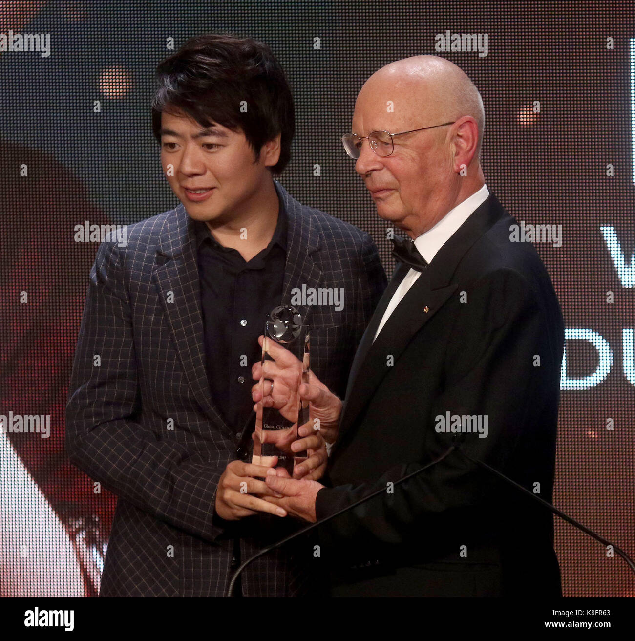 New York, New York, USA. 19th Sep, 2017. Founder and Executive Chairman of the World Economic Forum, presenter KLAUS SCHWAB and award recipient Chinese pianist LANG LANG attend the Atlantic Council 2017 Global Citizen Awards held at the Intrepid Sea, Air, & Space Museum. Credit: Nancy Kaszerman/ZUMA Wire/Alamy Live News Stock Photo