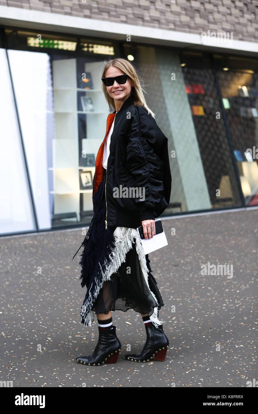 Holli Rogers posing outside of the Christopher Kane runway show during ...
