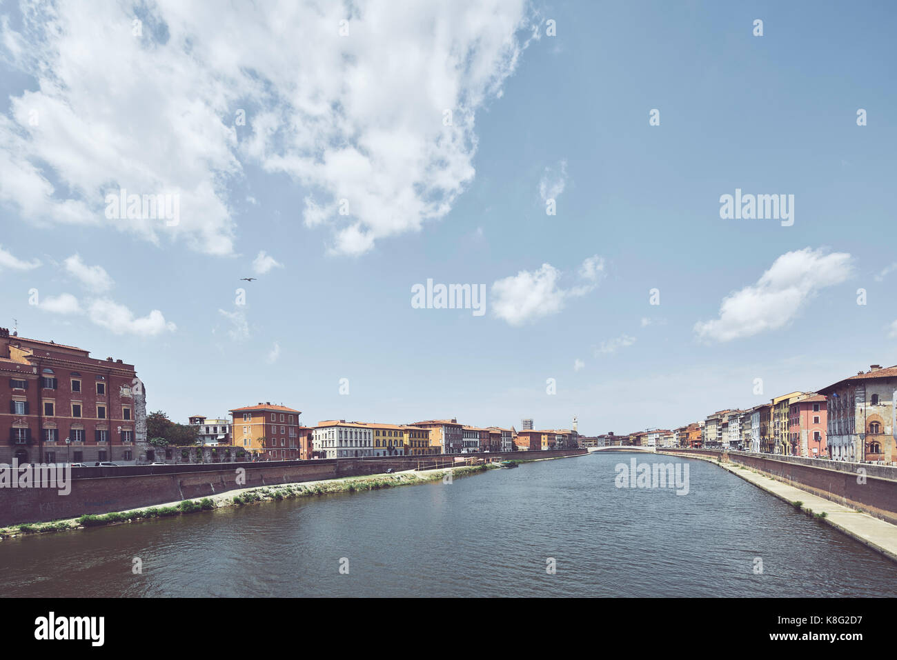 Traditional townhouses and apartments on waterfront of Arno river, Pisa, Tuscany, Italy Stock Photo