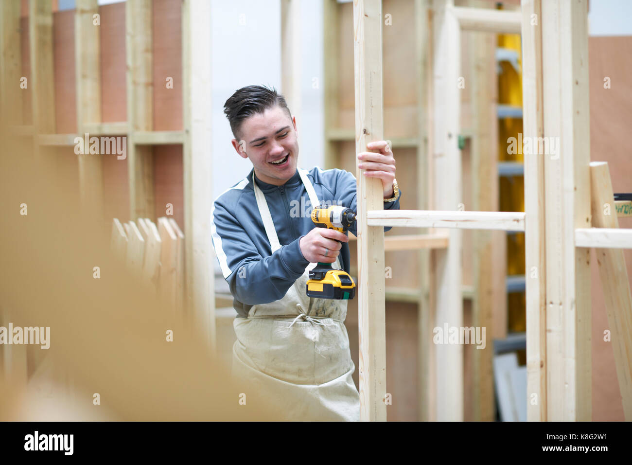 Student learning how to do building work Stock Photo Alamy