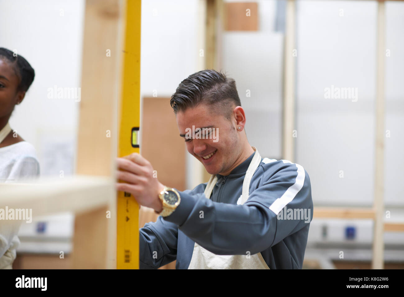 Student learning how to do building work Stock Photo Alamy