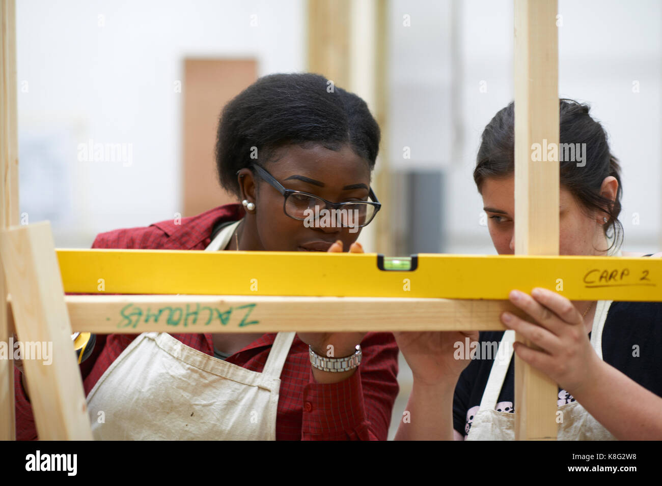 Student learning how to do building work Stock Photo