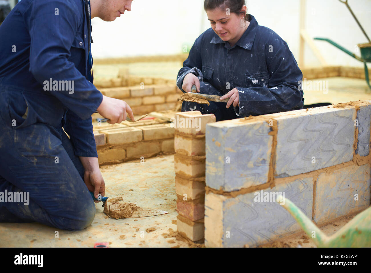 Student learning how to do building work Stock Photo - Alamy