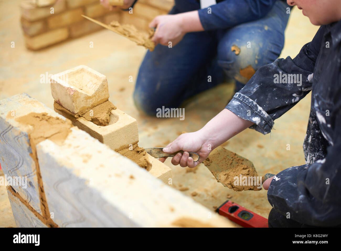 Student learning how to do building work Stock Photo
