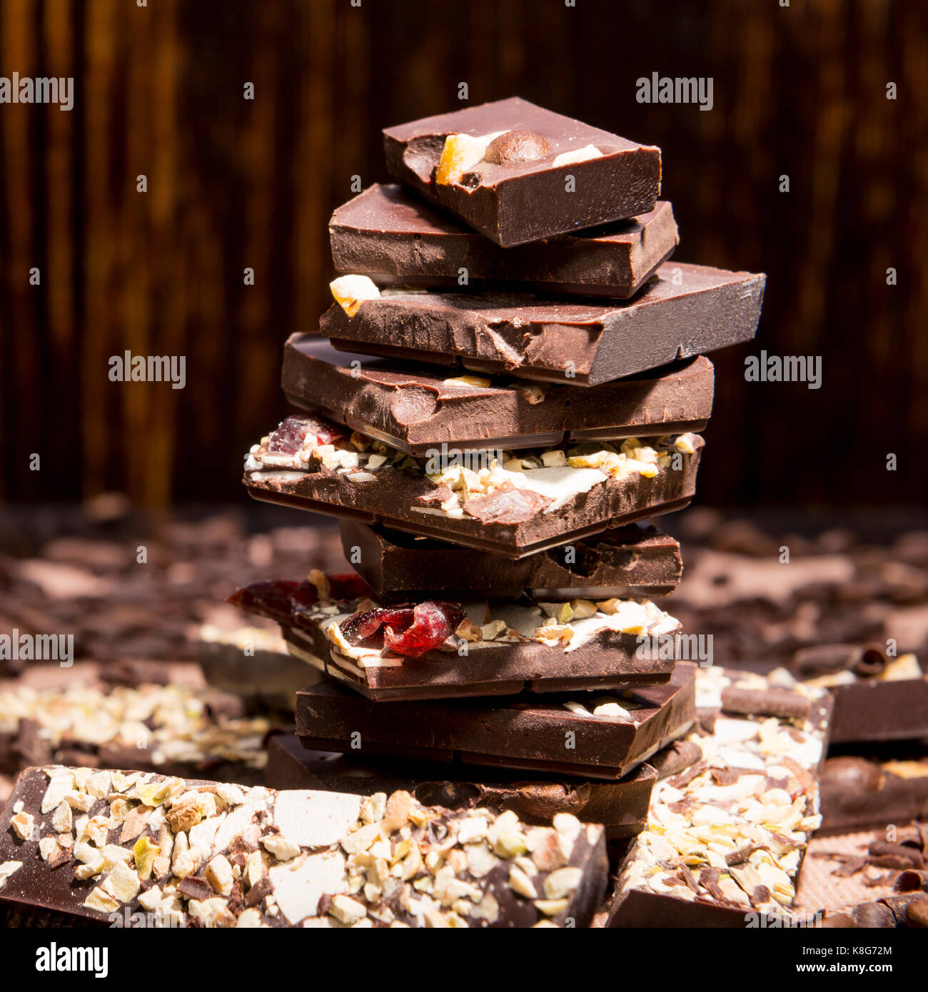 stack of chocolate on a wooden background Stock Photo - Alamy