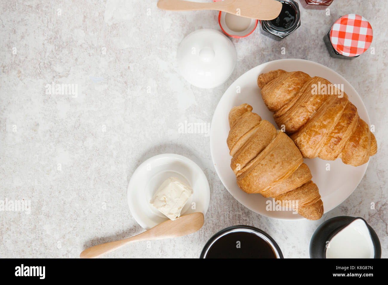 Overhead view of croissants served in plate on table Stock Photo