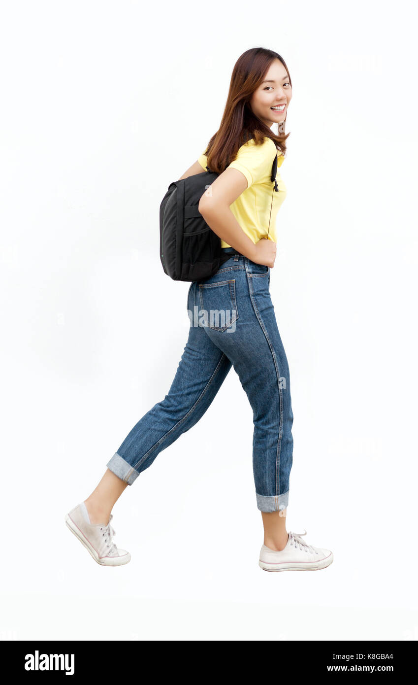 portrait happy teenage asian smile action with backpack and casual wearing to university or camp on white isolate background Stock Photo