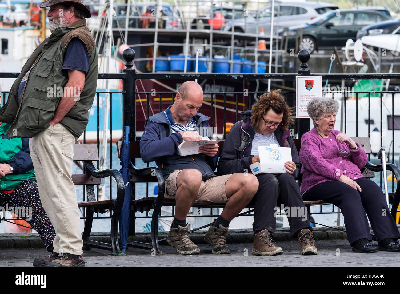 Padstow holidaymakers on a staycation holiday relaxing and eating