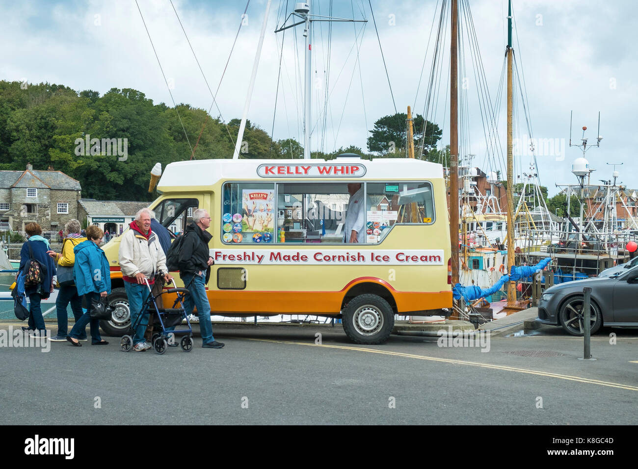 Ice cream truck - a Kellys Ice Cream van parked near the harbour in Padstow on the North Cornwall coast. Stock Photo