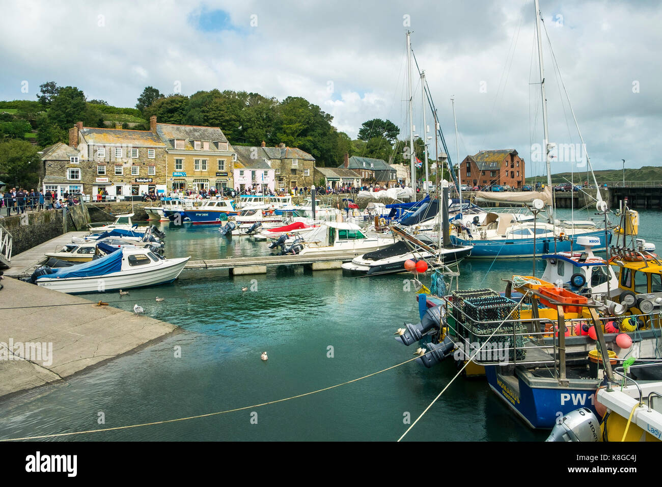 Padstow various boats and fishing boats moored in the historic Padstow