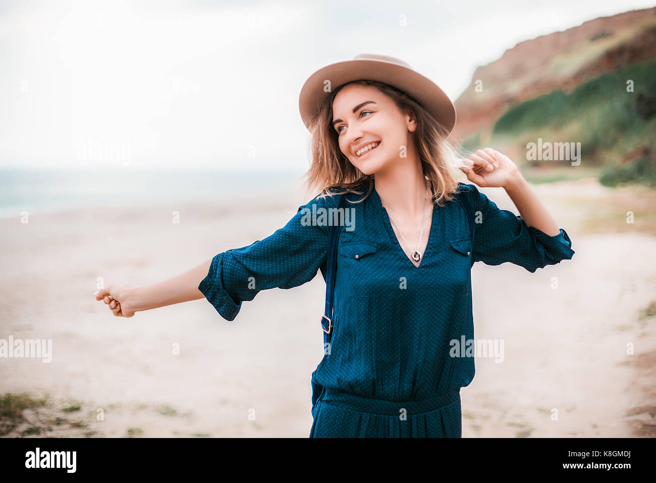 Woman dancing with blue dress hi-res stock photography and images - Alamy