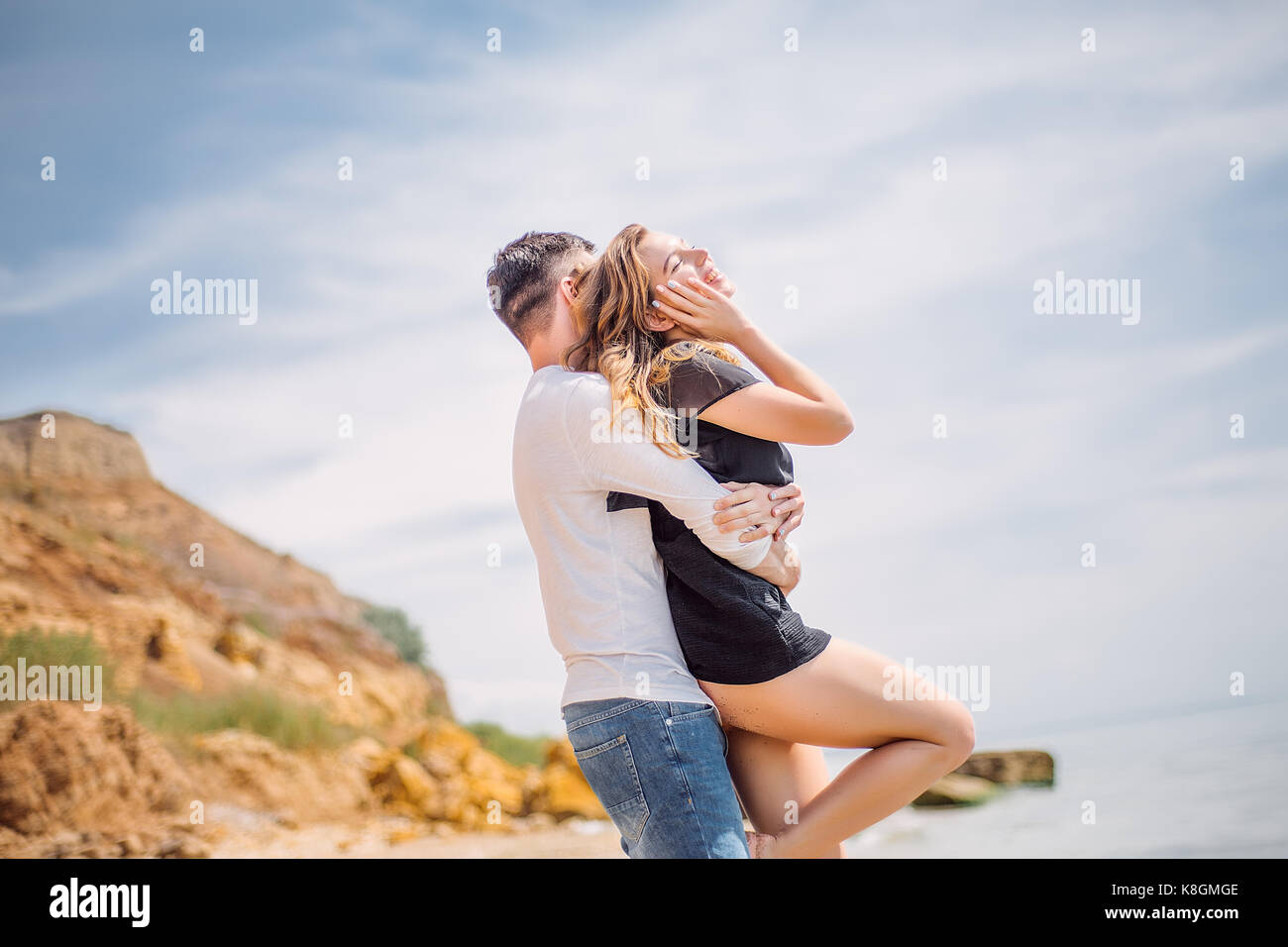 Couple on beach, Odessa, Ukraine Stock Photo