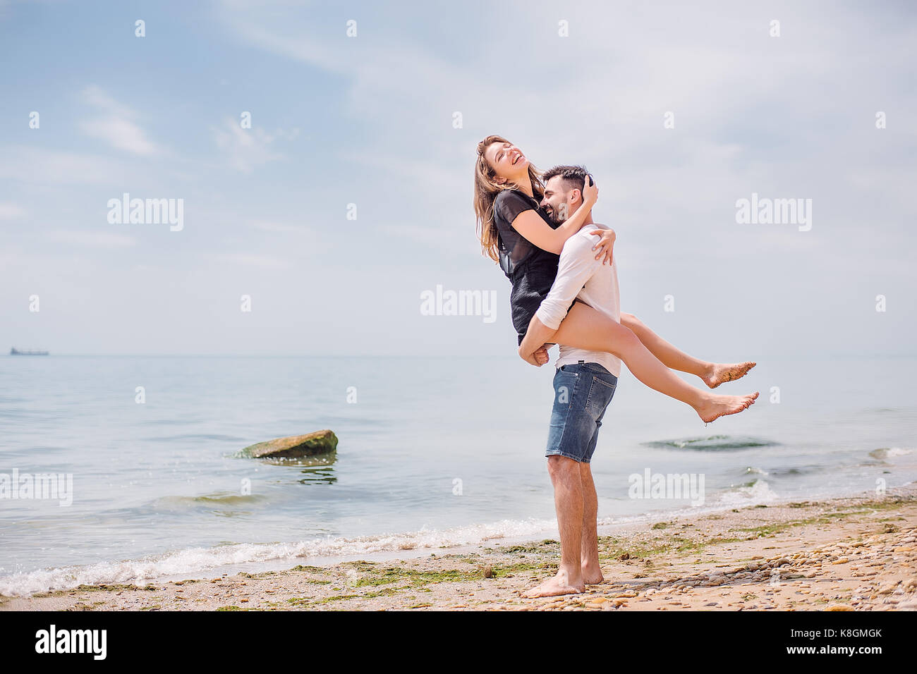 Couple on beach, Odessa, Ukraine Stock Photo
