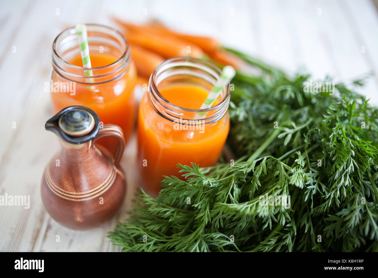 Fresh carrot juice in a bottle Stock Photo Alamy