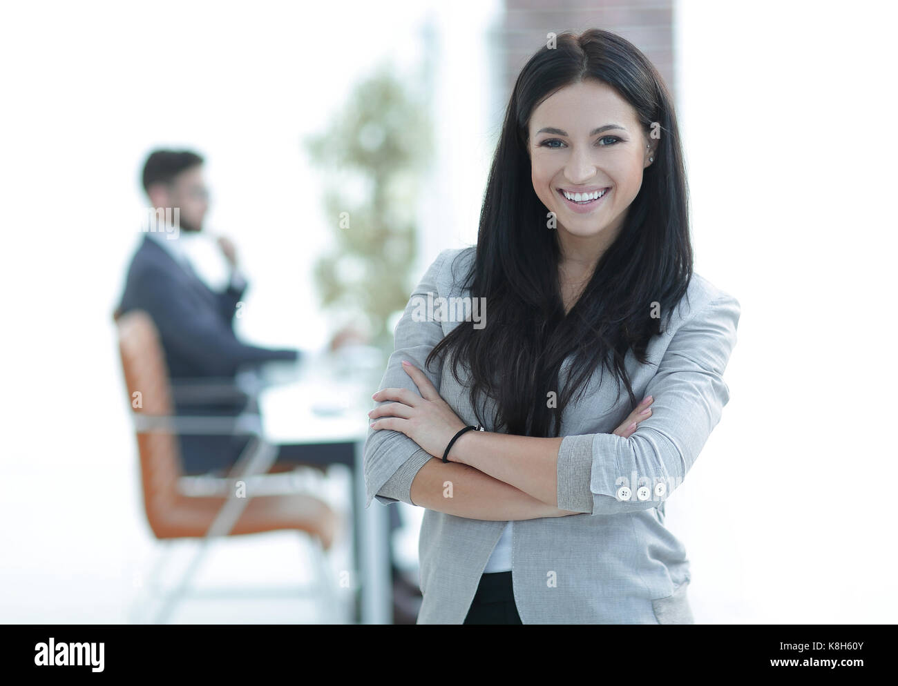 successful young business woman on the office background Stock Photo ...