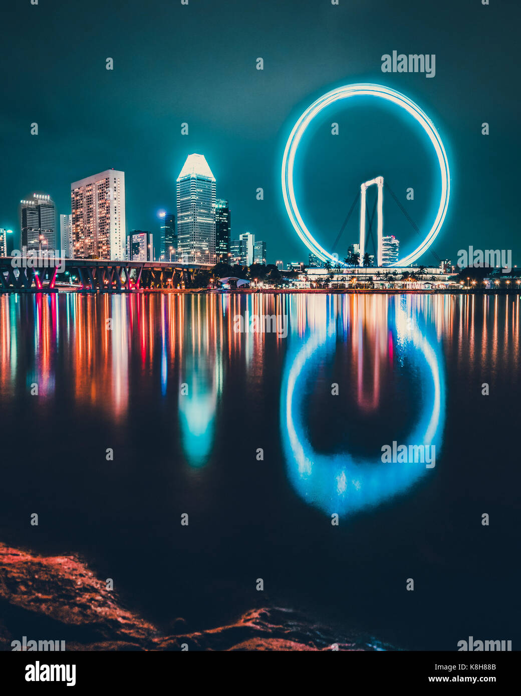 Long exposure of the Singapore flyer and its surroundings Stock Photo