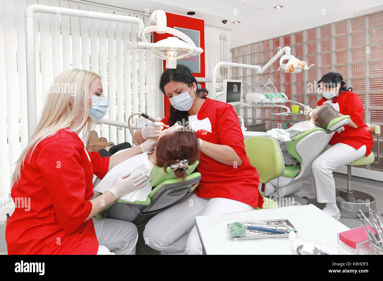 Female dentists at work in modern dental office Stock Photo Alamy