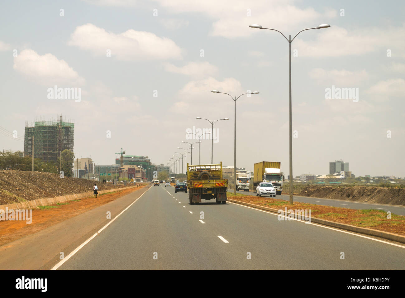 Southern bypass highway with vehicles driving in both directions, Kenya Stock Photo