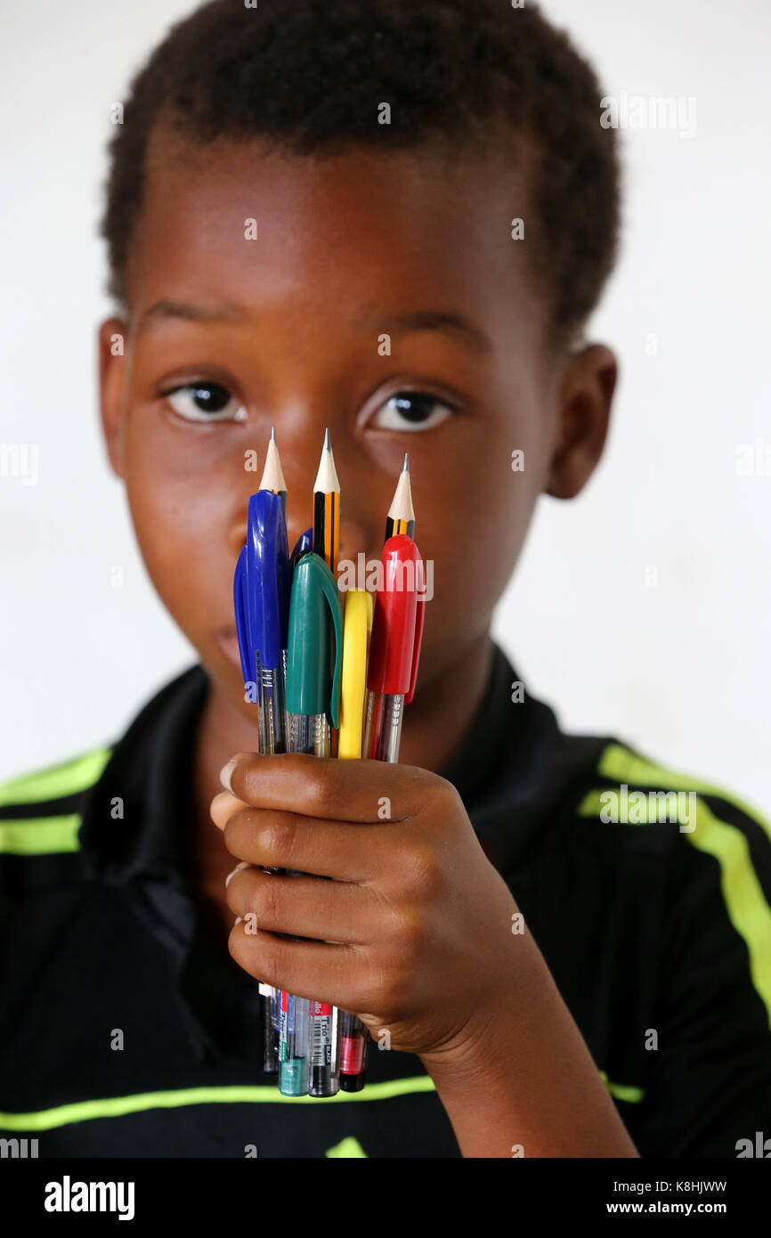 African primary school. child sponsored by the ngo la chaine de l'espoir. lome. togo. Stock Photo