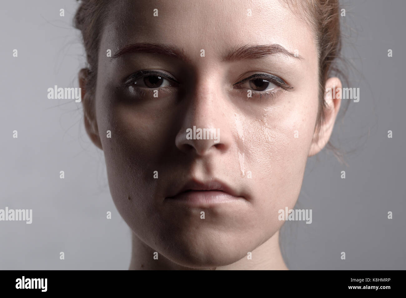 Portrait of a Redhead Crying Woman Stock Photo