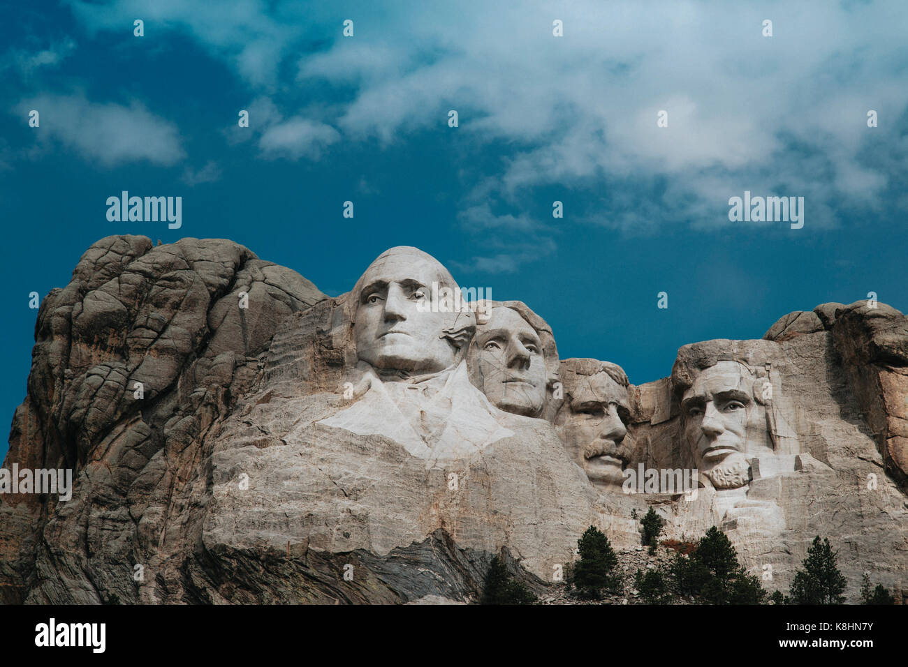 Low angle view of Mt Rushmore National Monument against cloudy sky Stock Photo