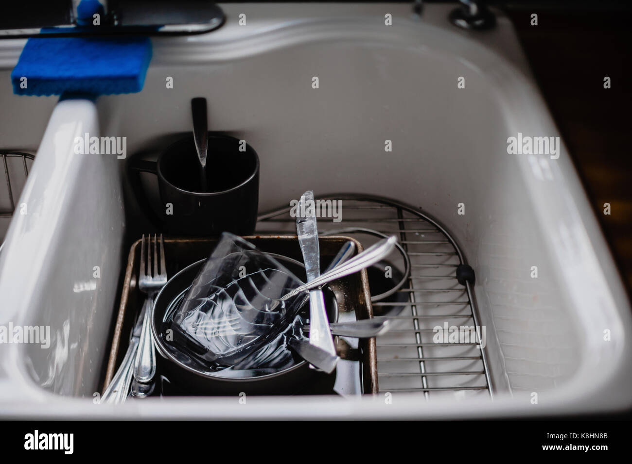 High angle view of utensils in kitchen sink at home Stock Photo