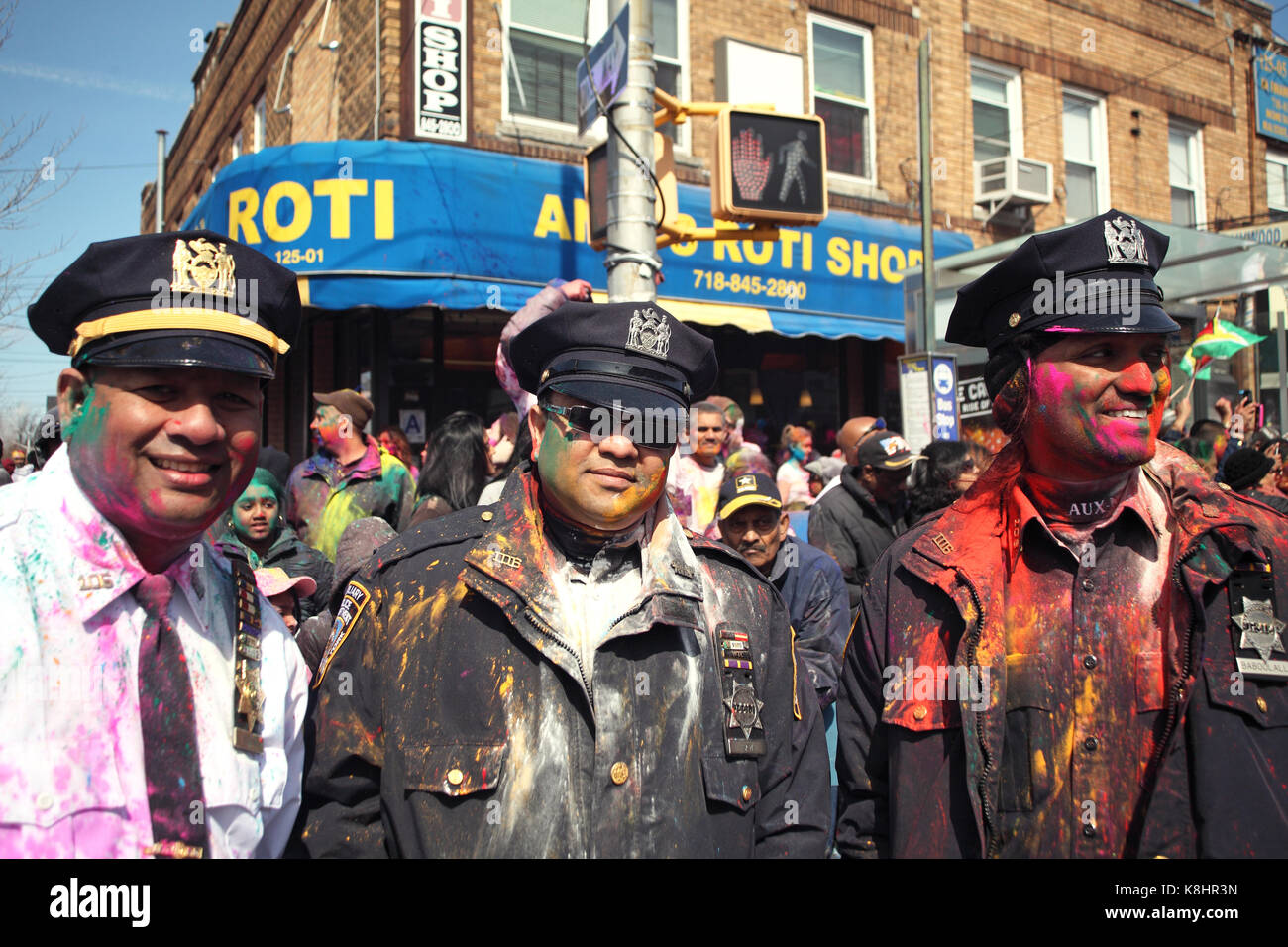 New York Police Department officers enjoy the Phagwah Parade