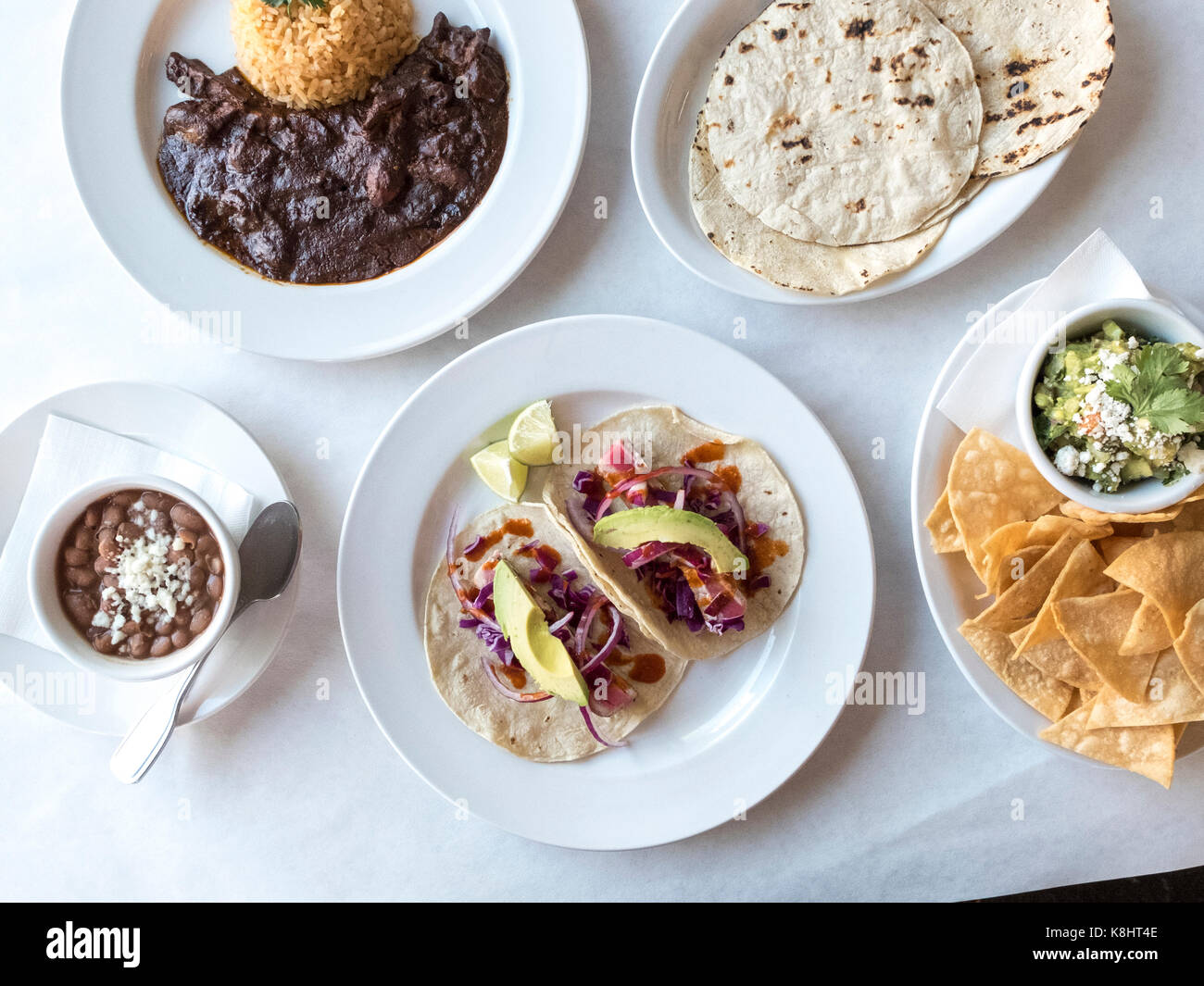 Overhead view of food served in plates on table Stock Photo