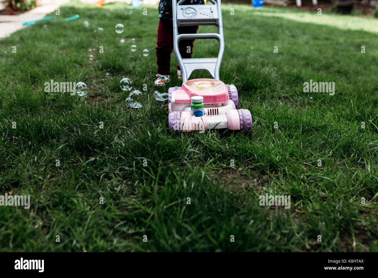 girl bubble lawn mower