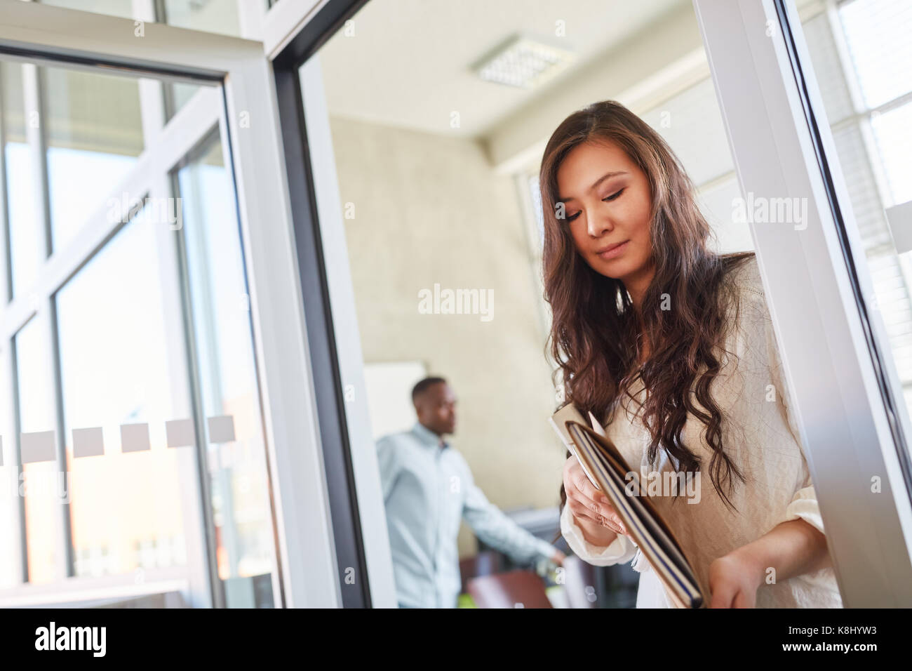 Asian woman as trainee or student in university Stock Photo