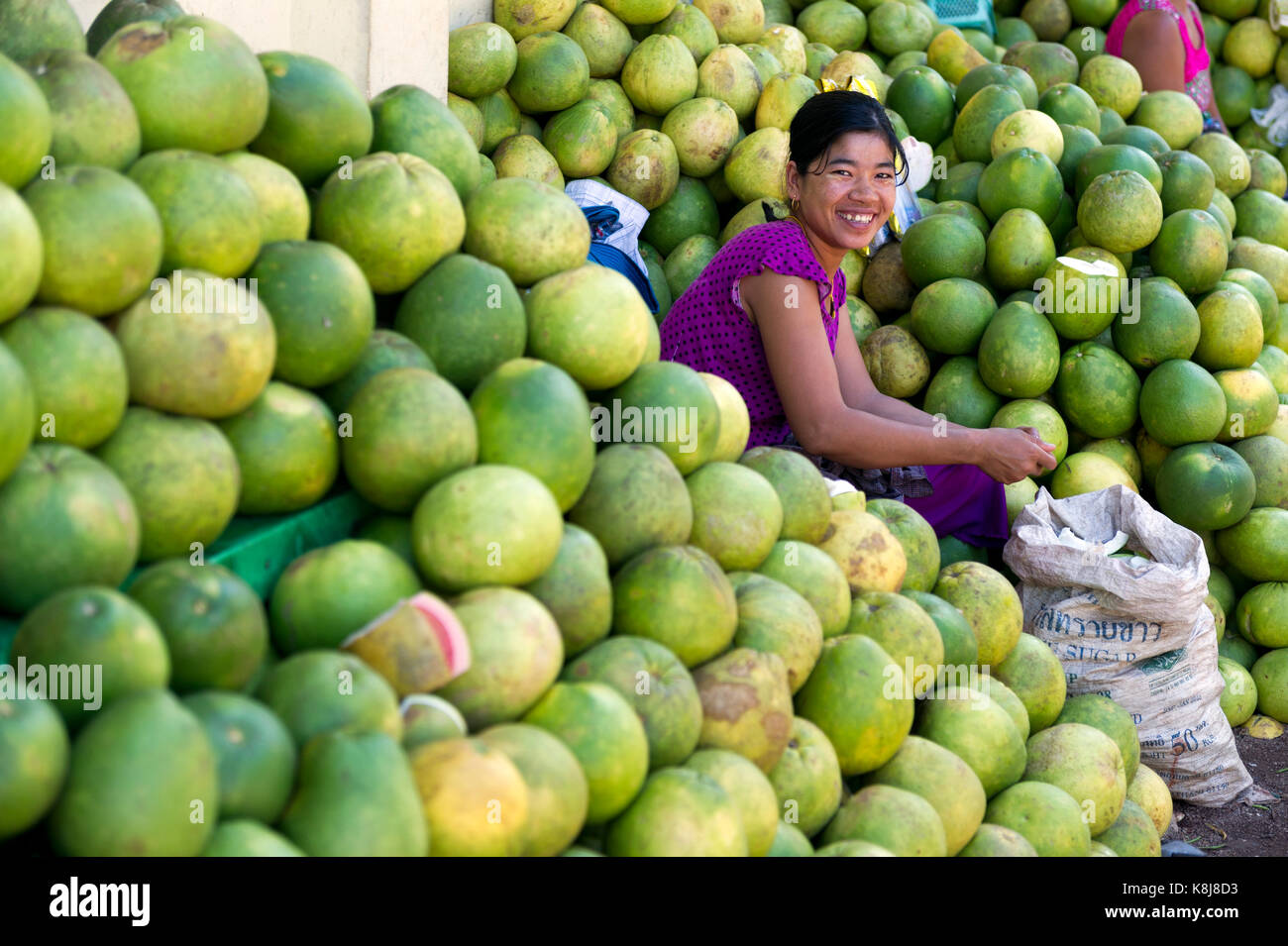 Myanmar (formerly Burma). Kyaiktiyo. State Mon. Grapefruit saleswoman