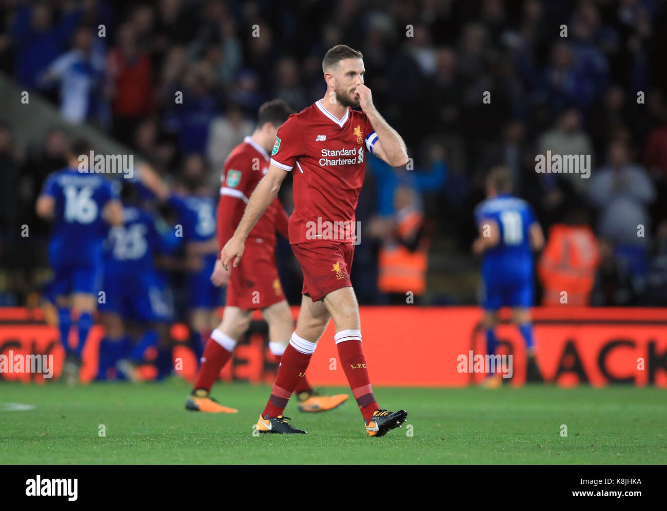 Liverpool S Jordan Henderson Stands Dejected As Leicester City S Shinji Okazaki Background Celebrates Scoring His Side S First Goal Of The Game With Team Mates During The Carabao Cup Third Round Match At The King