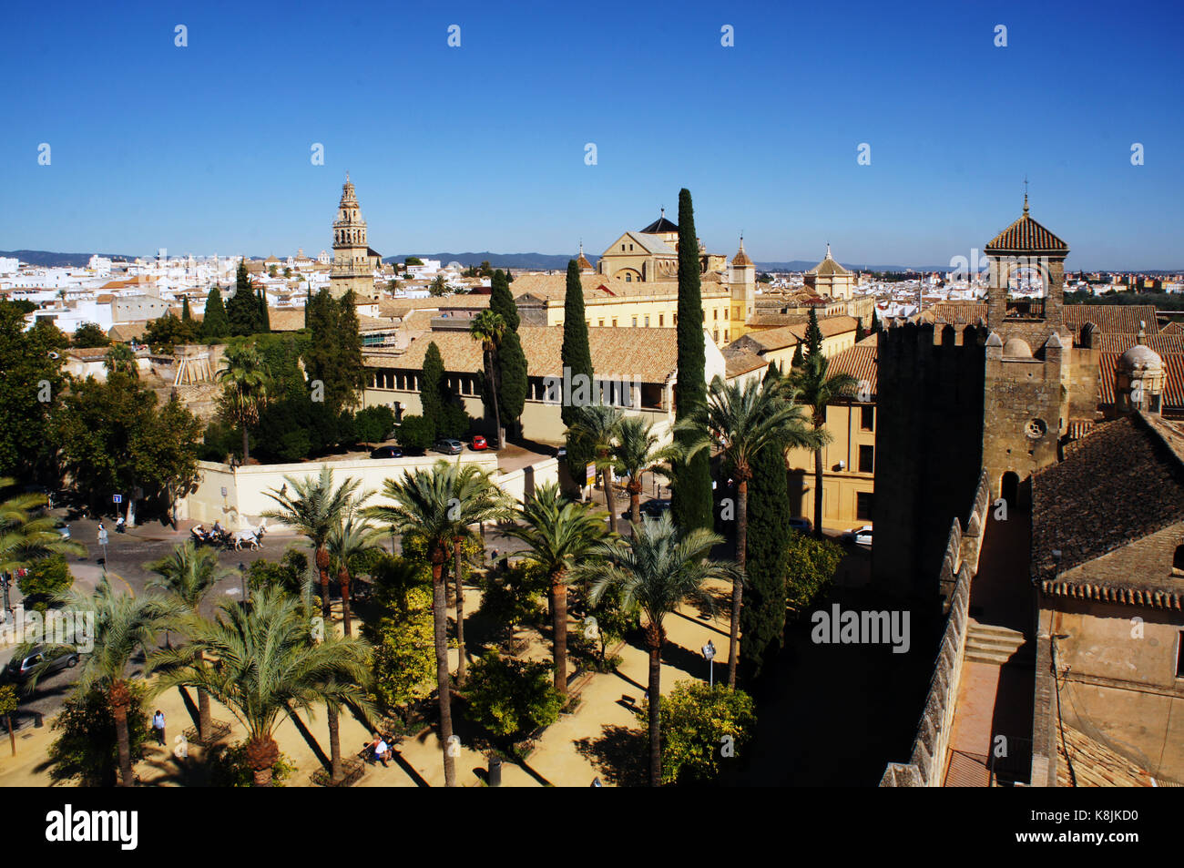 Panorama of Alcazar of Cordoba, Spain with trees towers and city line in background Stock Photo